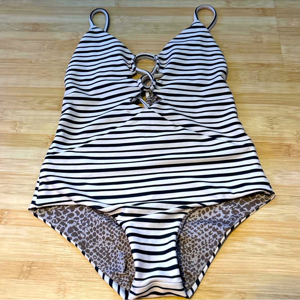Really cute acacia kids one piece.